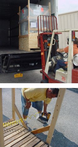 Worker carefully loading KO Fightgear heavy bags on a truck