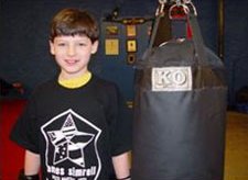 Joseph and his new KO Fighgear Youth Heavy Bag - Front View