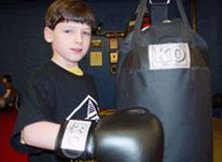 Joseph and his new KO Fighgear Youth Heavy Bag - Side View