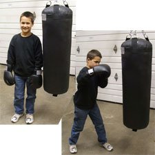 Cole With his KO Fightgear Youth Heavy Bag.